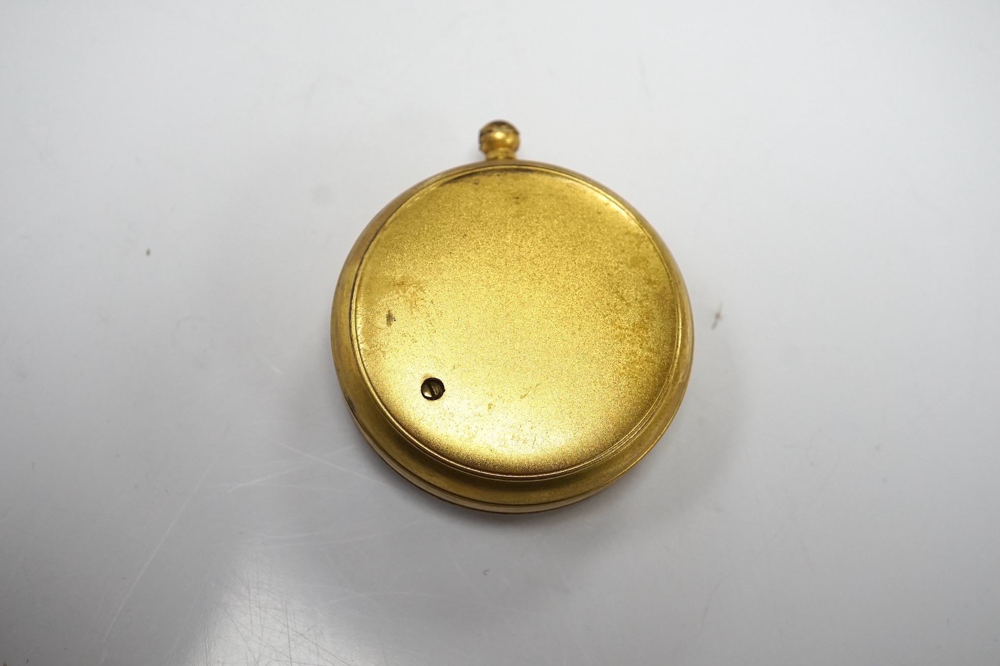 An Aitchison pocket barometer housed in original leather case, overall 6cm in diameter. Condition - fair